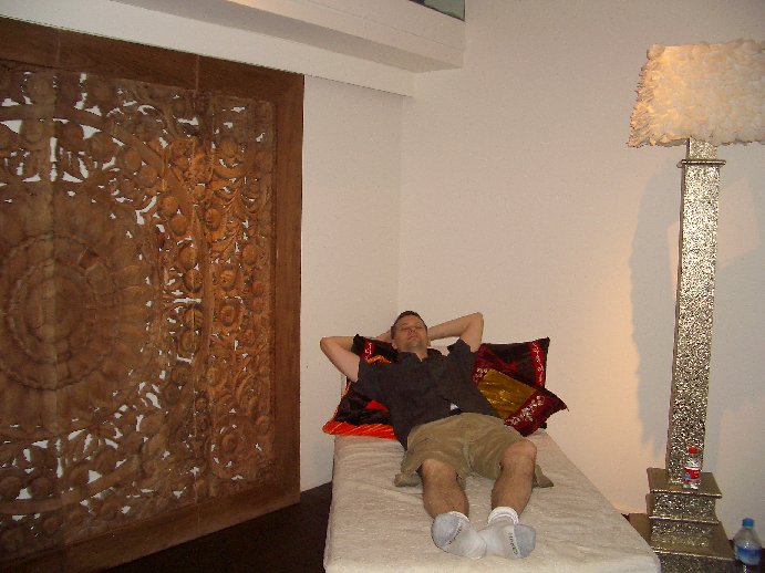 Ryan lounging in 
the Puro Hotel Room